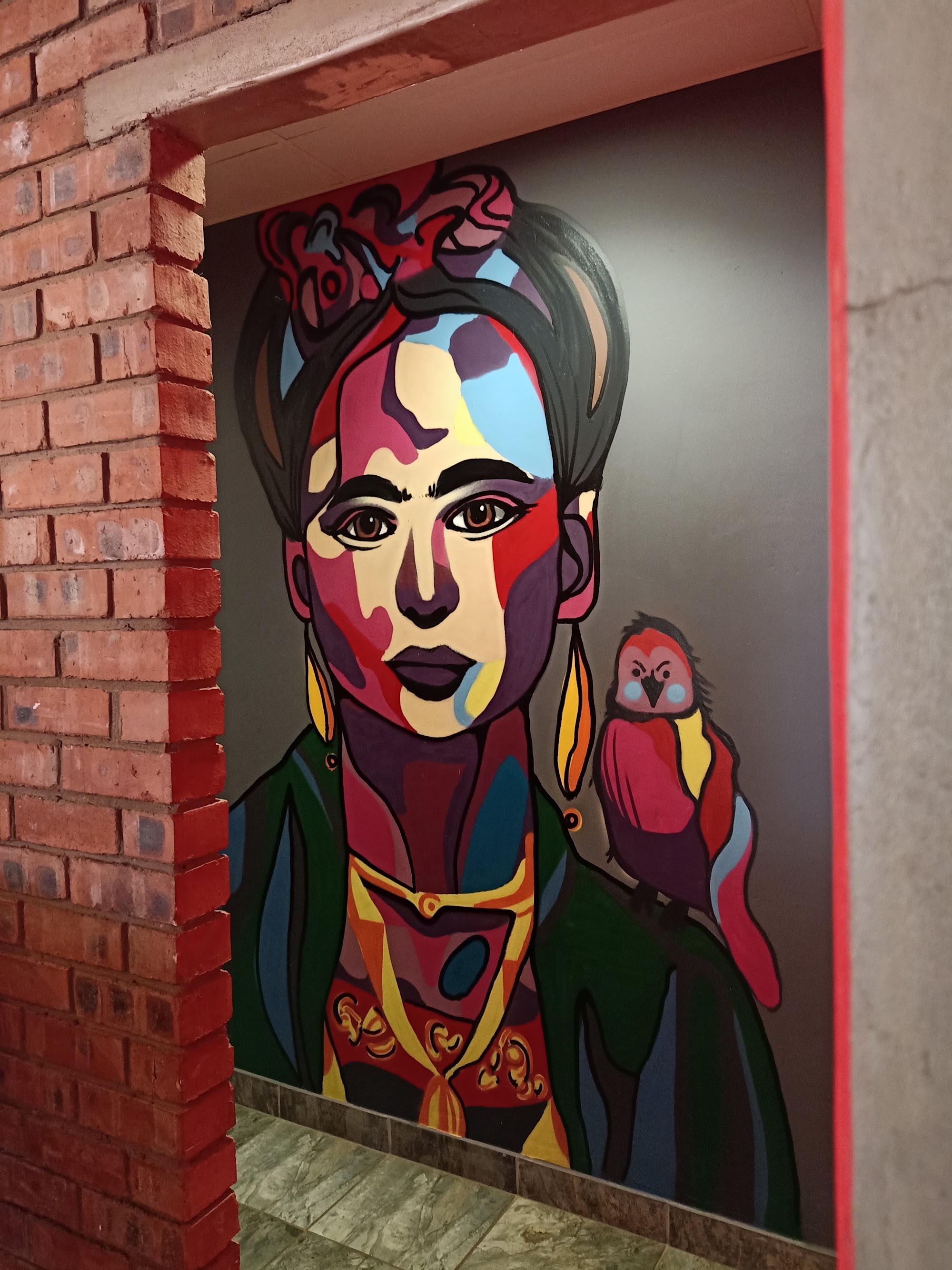 Frida — mural in Courtyard Entrance